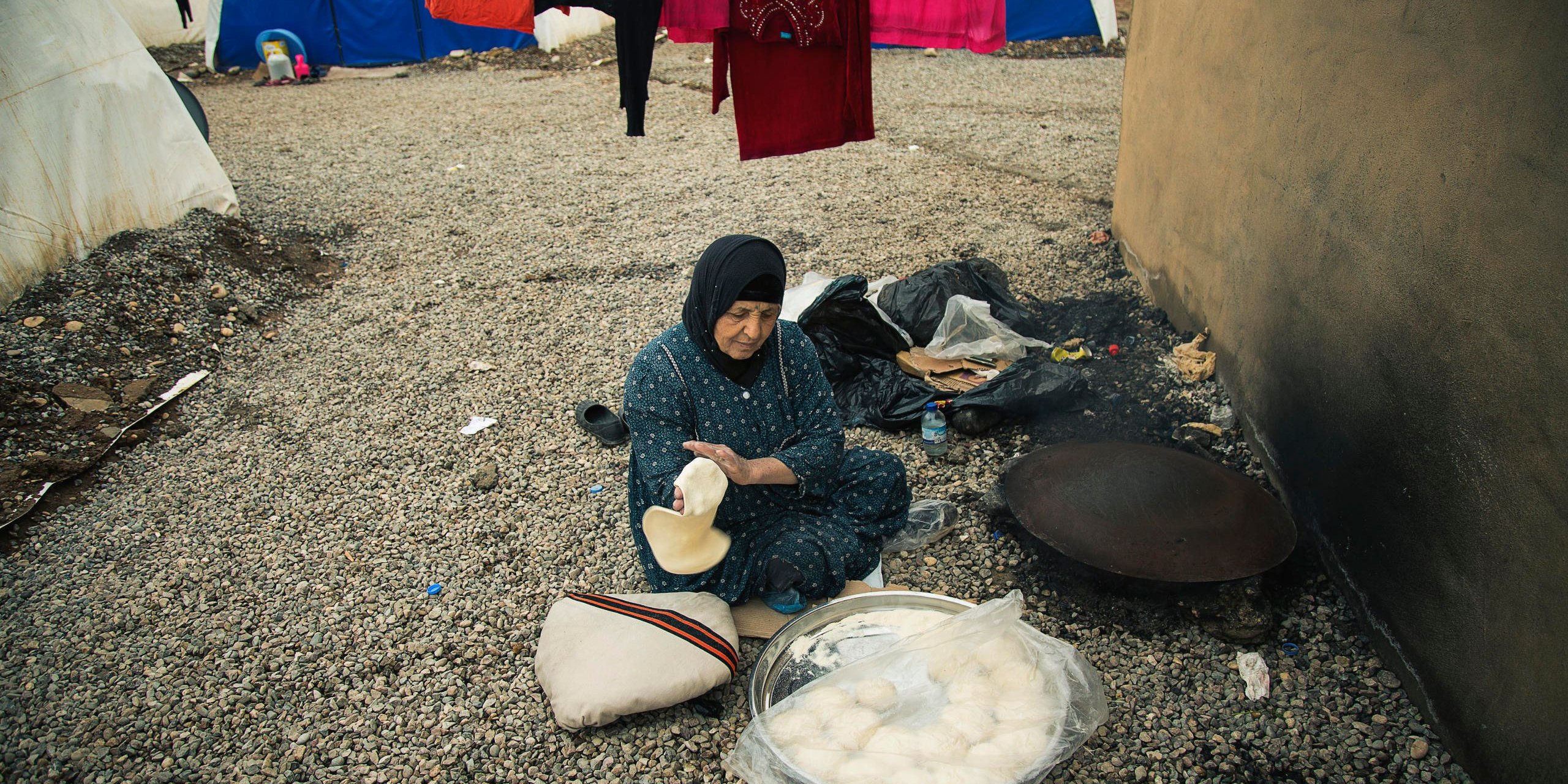 Newly displaced woman from Mosul and surrounding areas in Khazir camp 1 where NRC is present providing emergency aid such as food parcels, water and hygiene kits in addition to school support and safe spaces for children.
Photo: NRC/Hussein Amri