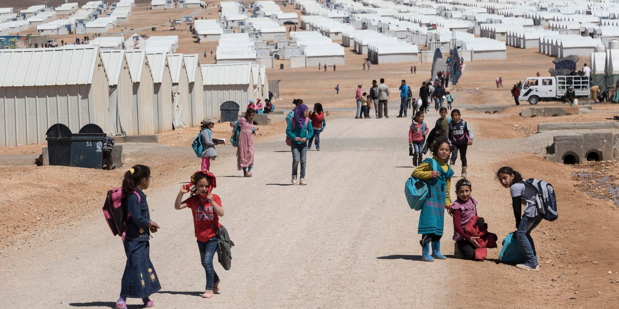 The Azraq refugee camp in Jordan is located 100km east of the capital city Amman, with a population of around 18,000 Syrian refugees. In Azraq, NRC has been central to the shelter response in coordination with UNHCR and Ministry of Public Works and Housing (MoPWH). Prior to the opening the camp NRC supported the design and construction of Transitional Shelters (T-Shelters) that are built for stronger endurance in the harsh weather conditions. Through local contractors and once the camp opened incentive refugee labour in coordination with SRAD and CARE, NRC teams in the camp constructed a total of 3,423 T-Shelters.
March, 2015.
Photo: NRC / Chris Herwig