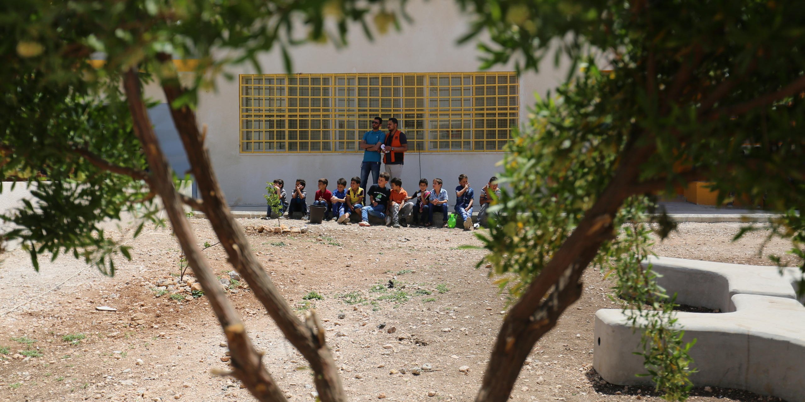 NRC has developed an education programme for local schools with a high rate of Syrian refugee students.
Through this project, developed together with the Jordanian Ministry of Education and funded by the Norwegian government and UNICEF, NRC is working to help expand overcrowded school. We’re supporting construction work and are collaborating with schools’ management teams to address the specific challenges they’re facing with this influx of students.
In total, the project has helped expand five schools throughout Irbid. It is alleviating some of the pressure off schools by reducing the number of students per classroom, and enabling both Syrian refugee students and Jordanian students to go to formal schools, often nearer to their homes, instead of commuting to farther schools.
These five schools in Irbid now boast 40 fully furnished classrooms, six sanitation facilities and six playgrounds. In total, the project has created 1,440 spaces for new students.
Photo: Hassan Hijazi/NRC