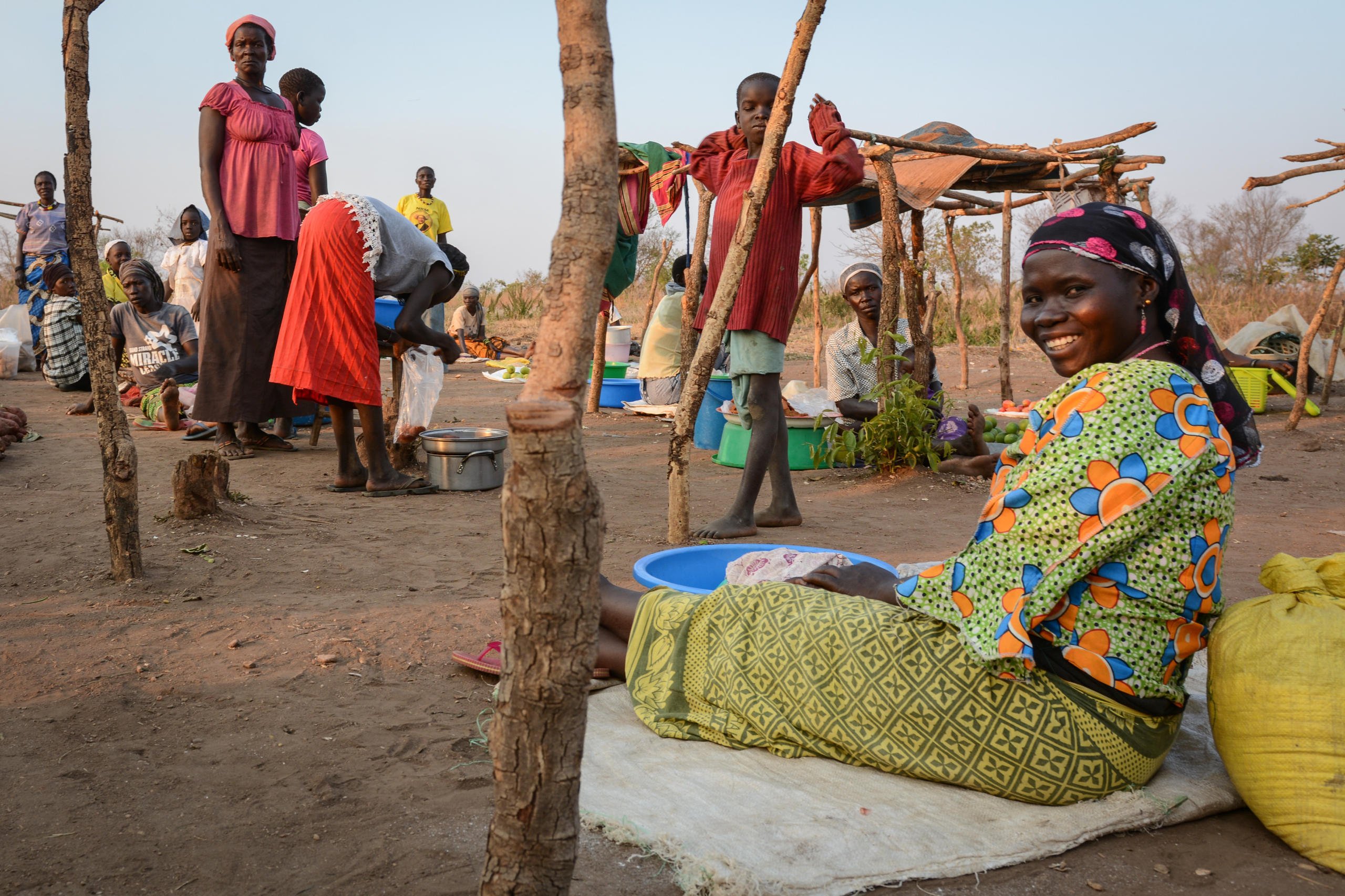 Markom Malima from Uganda is trying to sell some clothes at a market in Bidibidi, where refugees from South Sudan and members of the host community meet to sell and buy food and other goods.
“I’m happy the refugees have arrived here and welcome them. They have been suffering and we are able to provide them with security. Also, the business at the market is increasing. It is good to get some new costumers and some new vendors,” she explains.
Photo: NRC/Tiril Skarstein