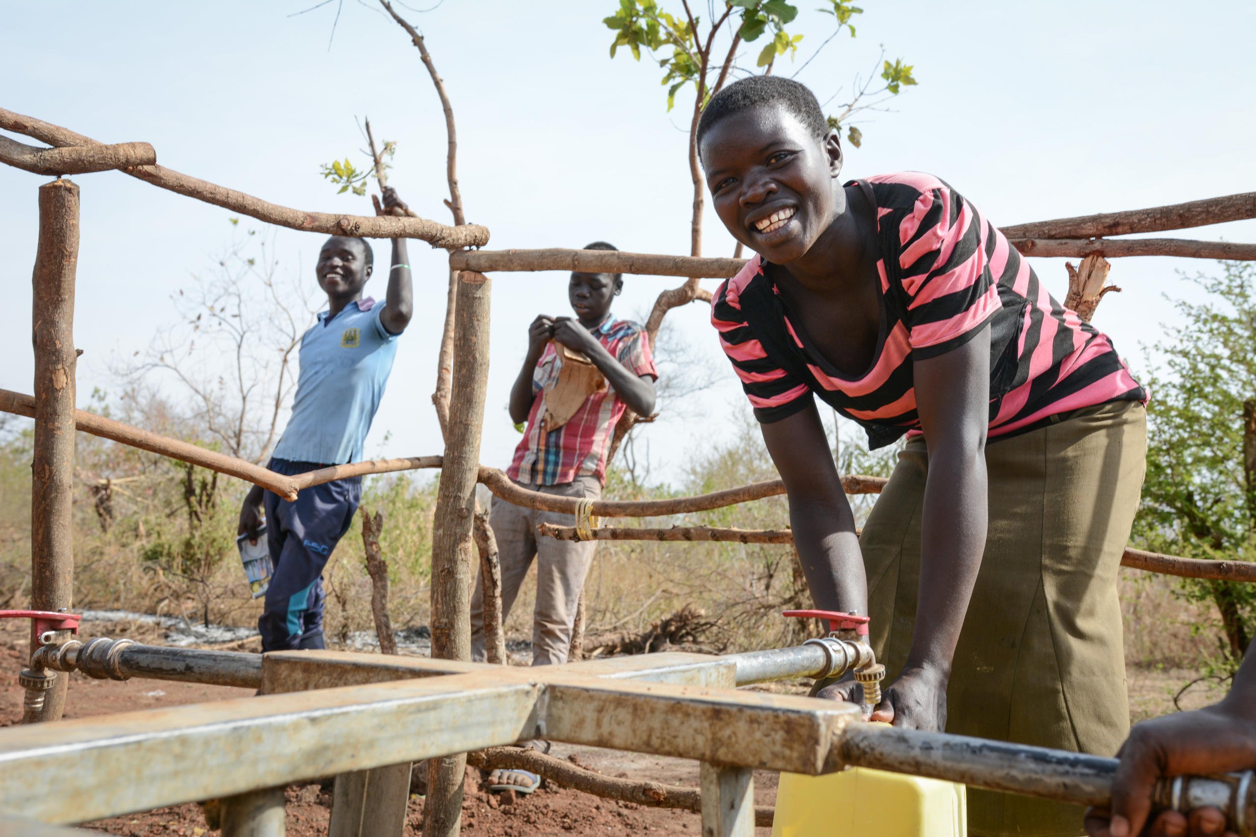 Florens Ajone is fetching water from a water point installed by NRC in Bidibidi settlement in Uganda. She fled the conflict in South Sudan in 2016.
Quotes: "We left because of the killing. They slaughtered people. So we left yei out of fear of what could happen to us there.
The roads were closed and it was a struggle to get here. Now we are okay. We no longer hear any gunshots and we’re safe."
Photo: NRC/Tiril Skarstein