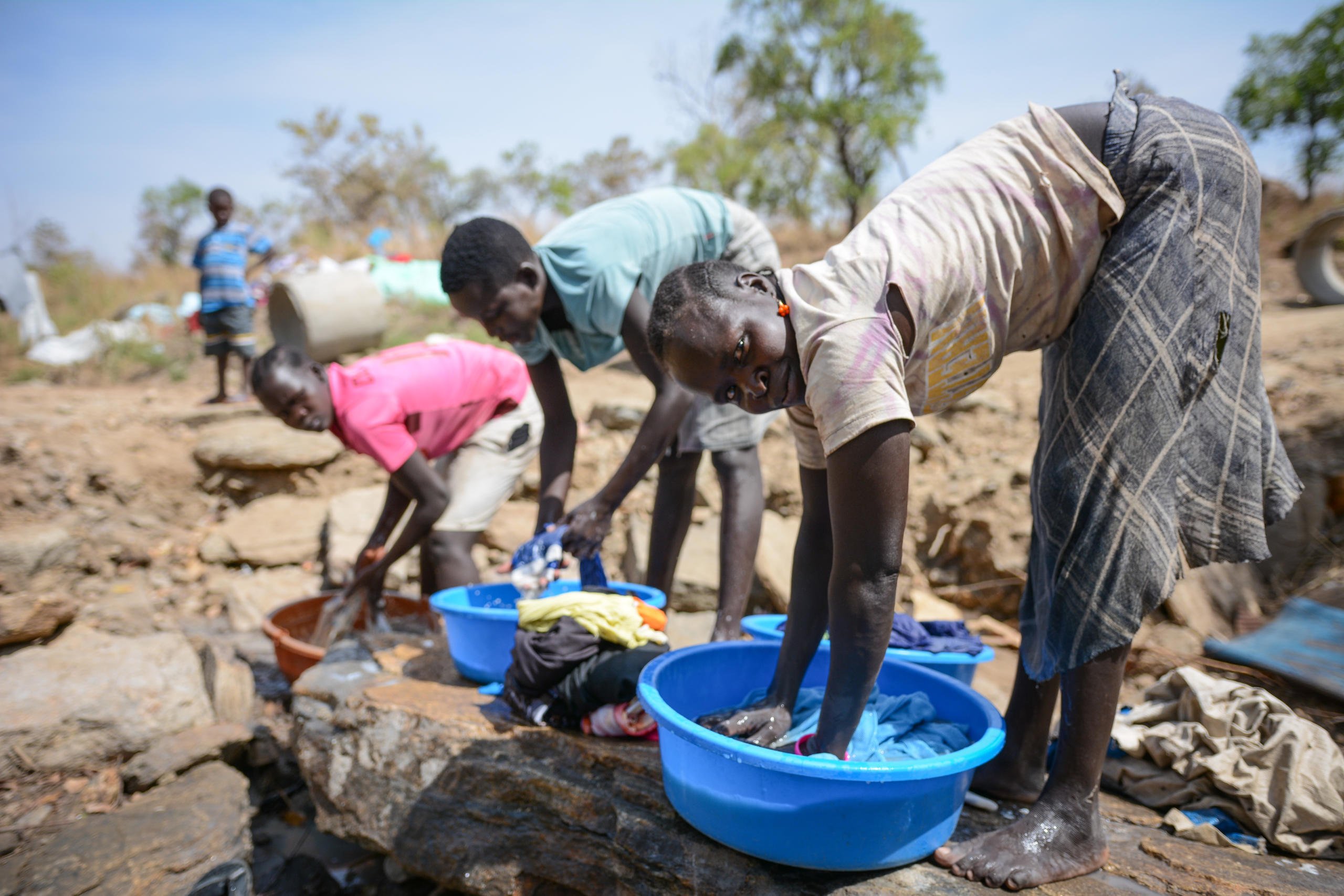 Apai Regina (25) is washing clothes in Bidibidi settlement. Together with her family she fled Juba this autumn and arrived Uganda 10 October 2016.
“My husband was killed when we fled towards Uganda. No I am alone here, trying my best to support my three children”, says Apai Regina.
She wishes her children can grow up in safety.
"I do not need to fear for the safety of my children here. I feel safe. The only problem for me now, is to be able to feed my children. I do not want them to go hungry," she says.
Photo: NRC/Tiril Skarstein