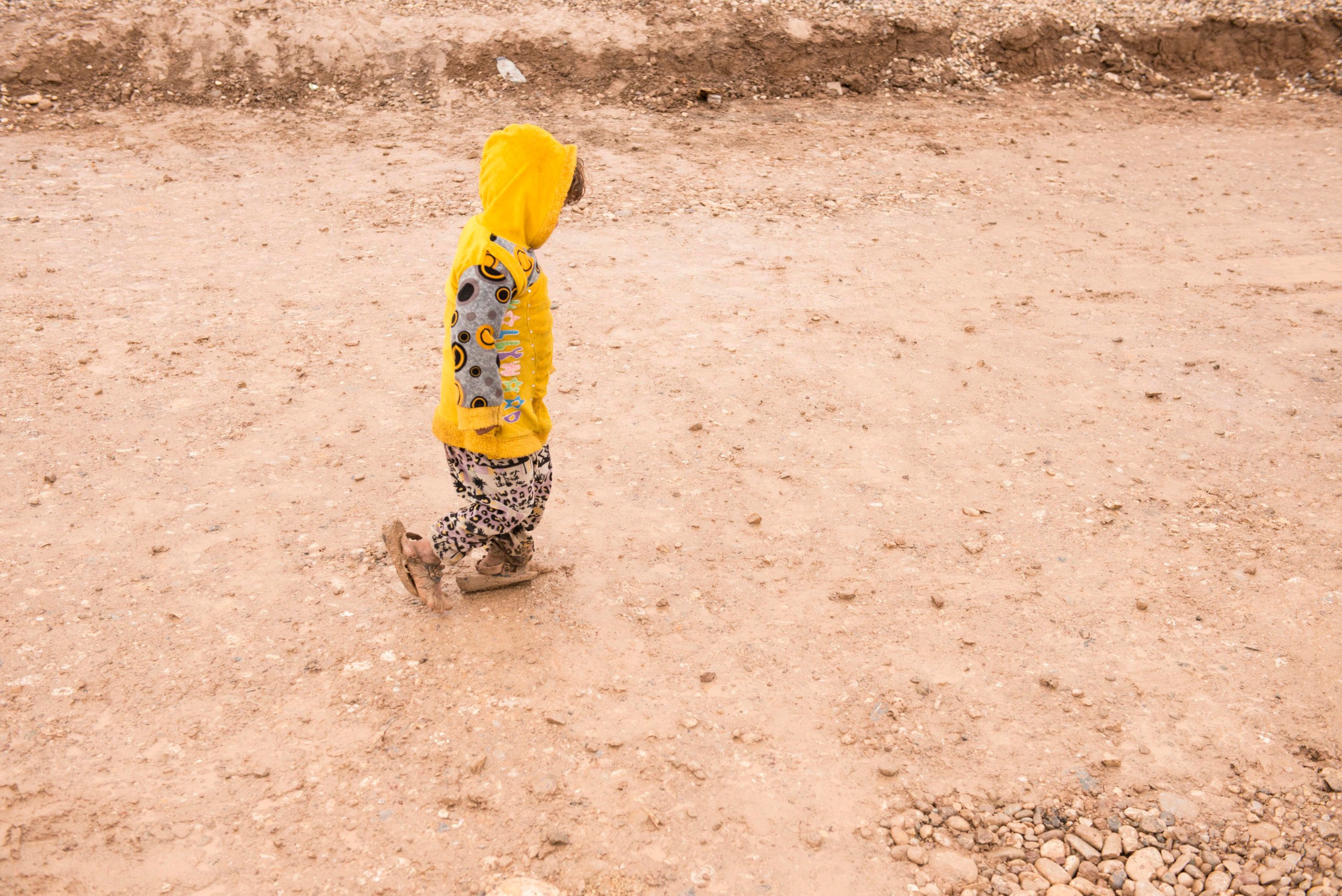 A toddler walks through the mud in a camp accommodating people who arrived yesterday after fleeing fighting in Mosul.
Date: 04 March 2017
Photo: NRC/Melany Markham