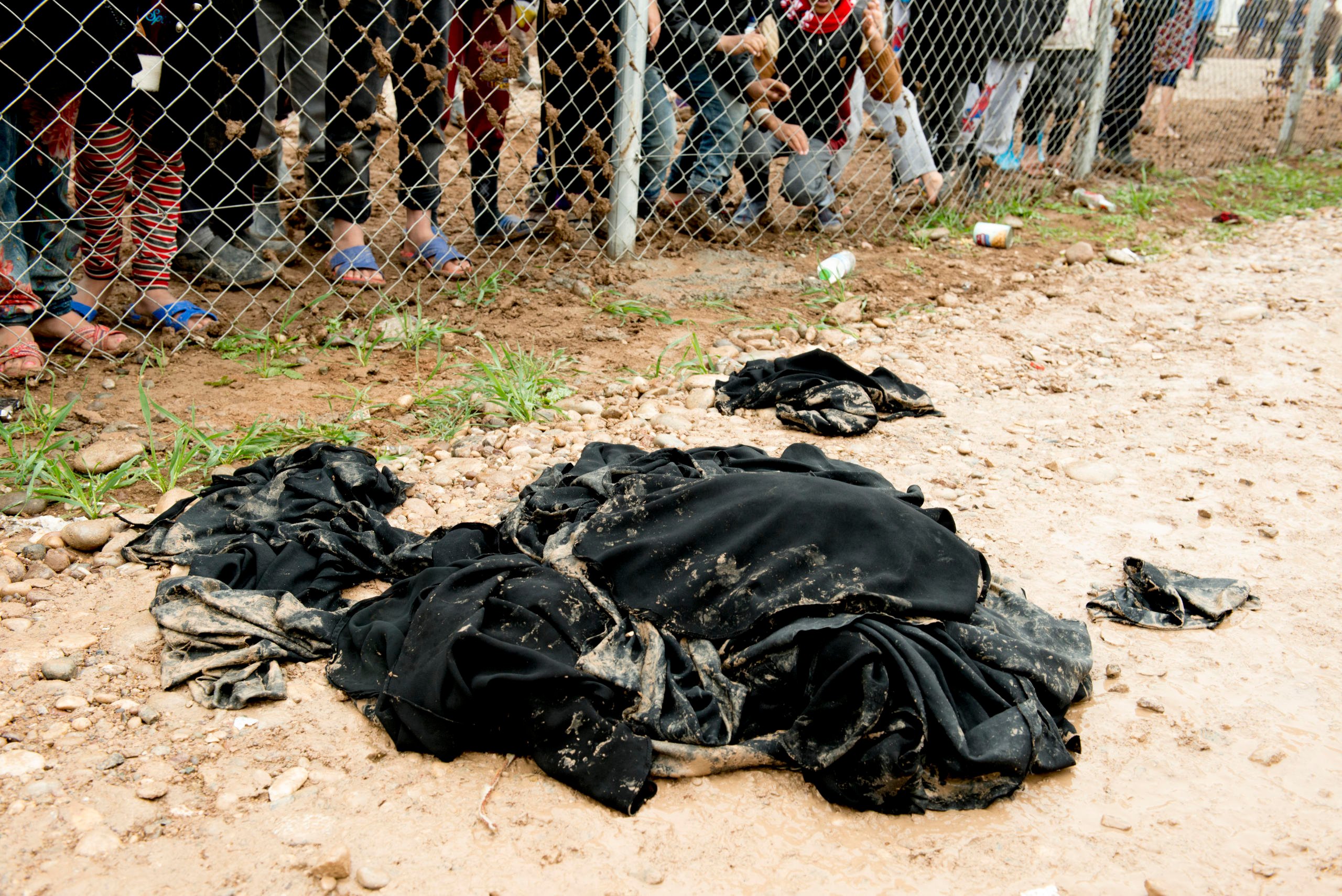 Discarded niqabs lie in a pile outside the camp where women took them off as soon as they arrived.
Date: 04 March 2017
Photo: NRC/Melany Markham