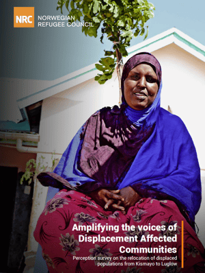 Front page of the "Amplifying the voices of Displacement Affected Communities" report. It shows a woman in a pink skirt and blue shawl smiling.