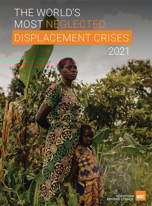 Front page of the report "The world’s most neglected displacement crises in 2021". A woman and her child are standing amongst wild greenery and plants.