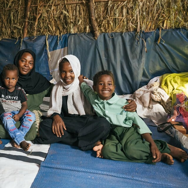 Portrait of a family from Sudan: Left to right: Tasabeeh, 12, Abdulbasit, 4, Hawa, Tasnim, 13, and Mohamed, 8.