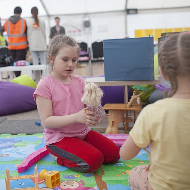 Children playing on the floor.