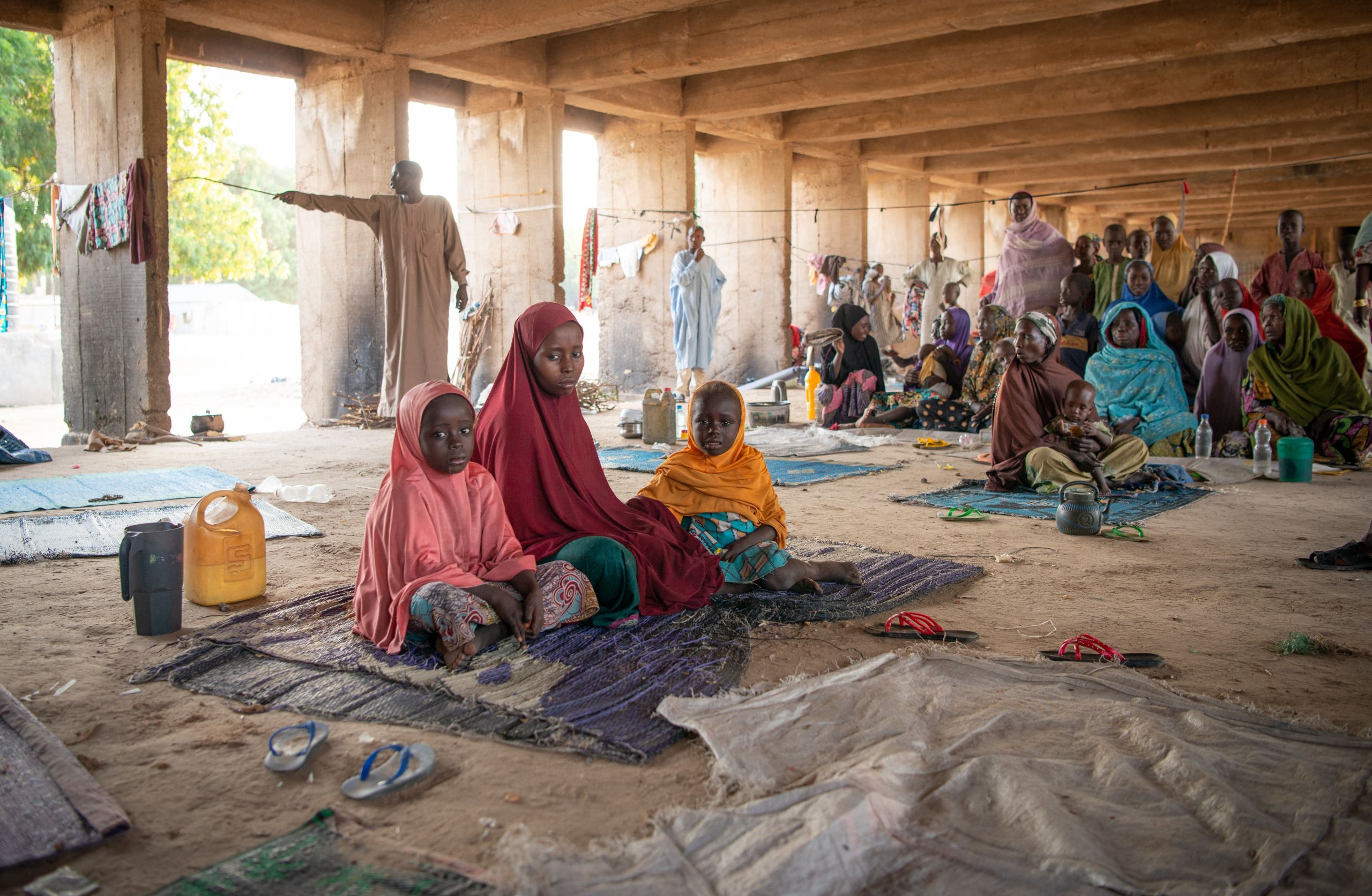 Displaced persons who had fled violence in northeast Nigeria are taking refuge in a camp in Maiduguri. Displaced families survive with the bare minimum, sleep on mats with no possibility of privacy. Photo: Beate Simarud/NRC