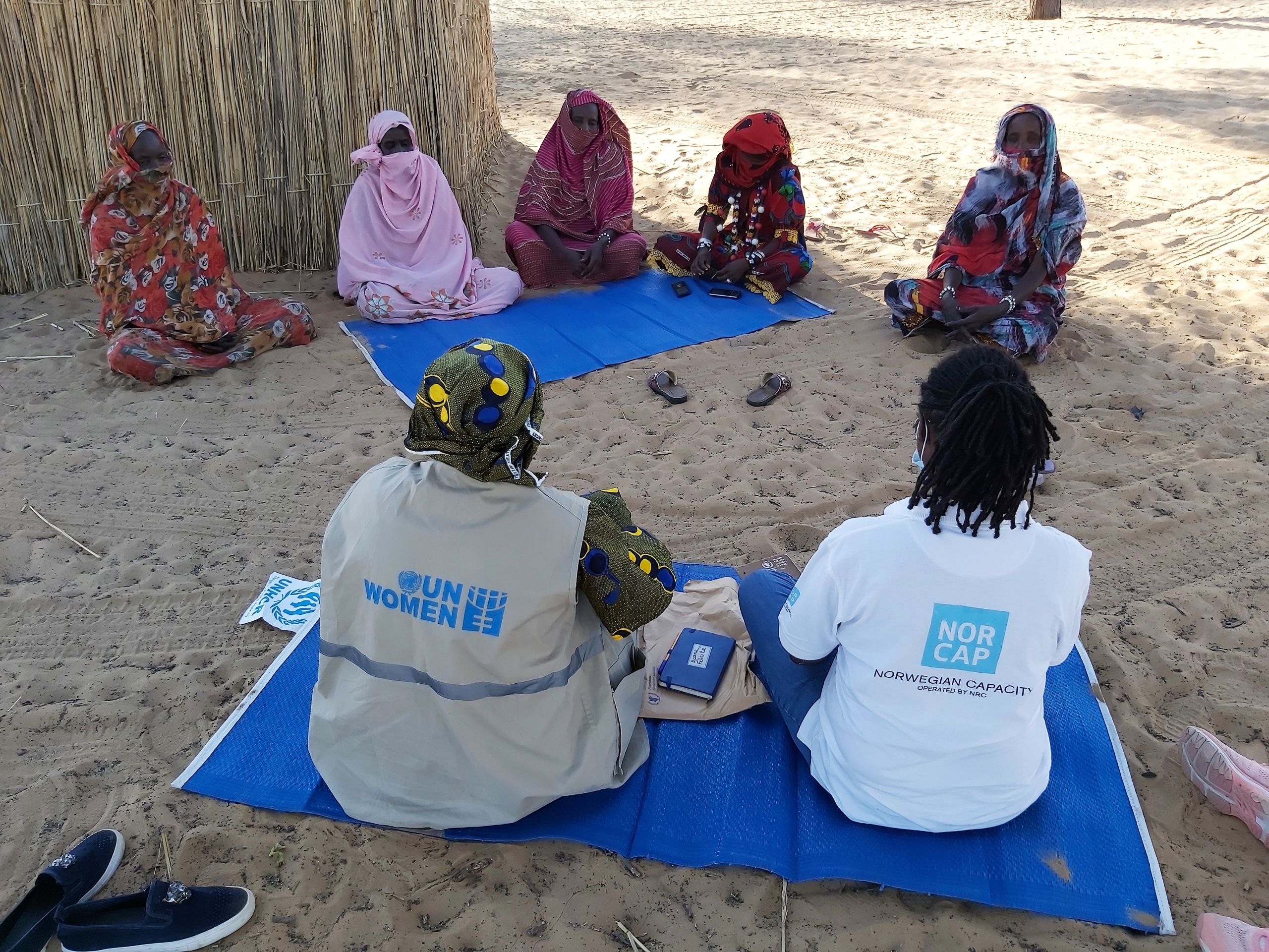 Senior Gender and Capacity Building Specialist Diane Felicite Magnikeu Ngamo (on the right) a focus group discussion with leaders of the internally displaced women's group in Chad in December 2020