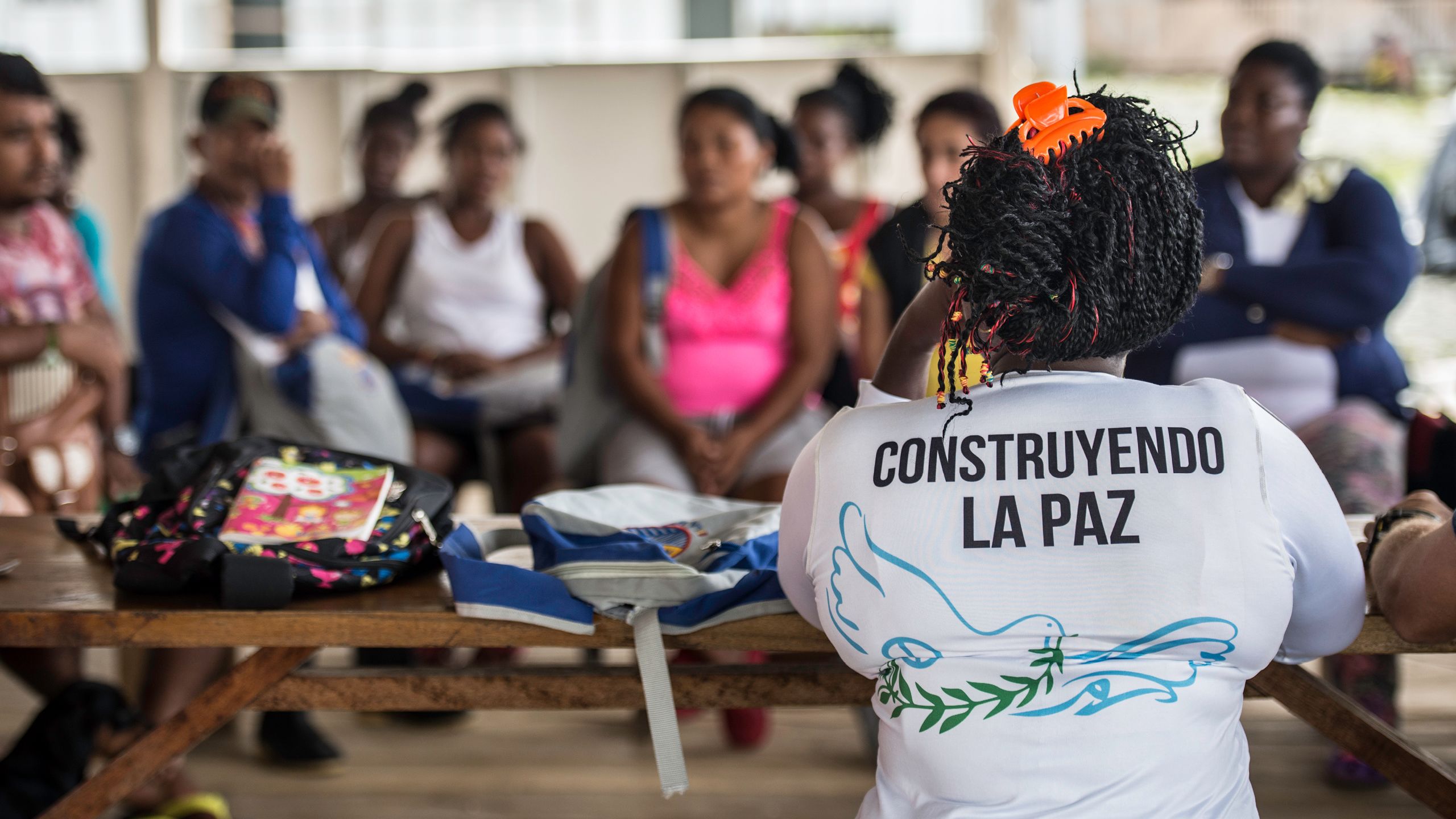 Former soldiers in Colombia's oldest guerrilla group, FARC, which also includes women, have put down their weapons and instead started attending school.
