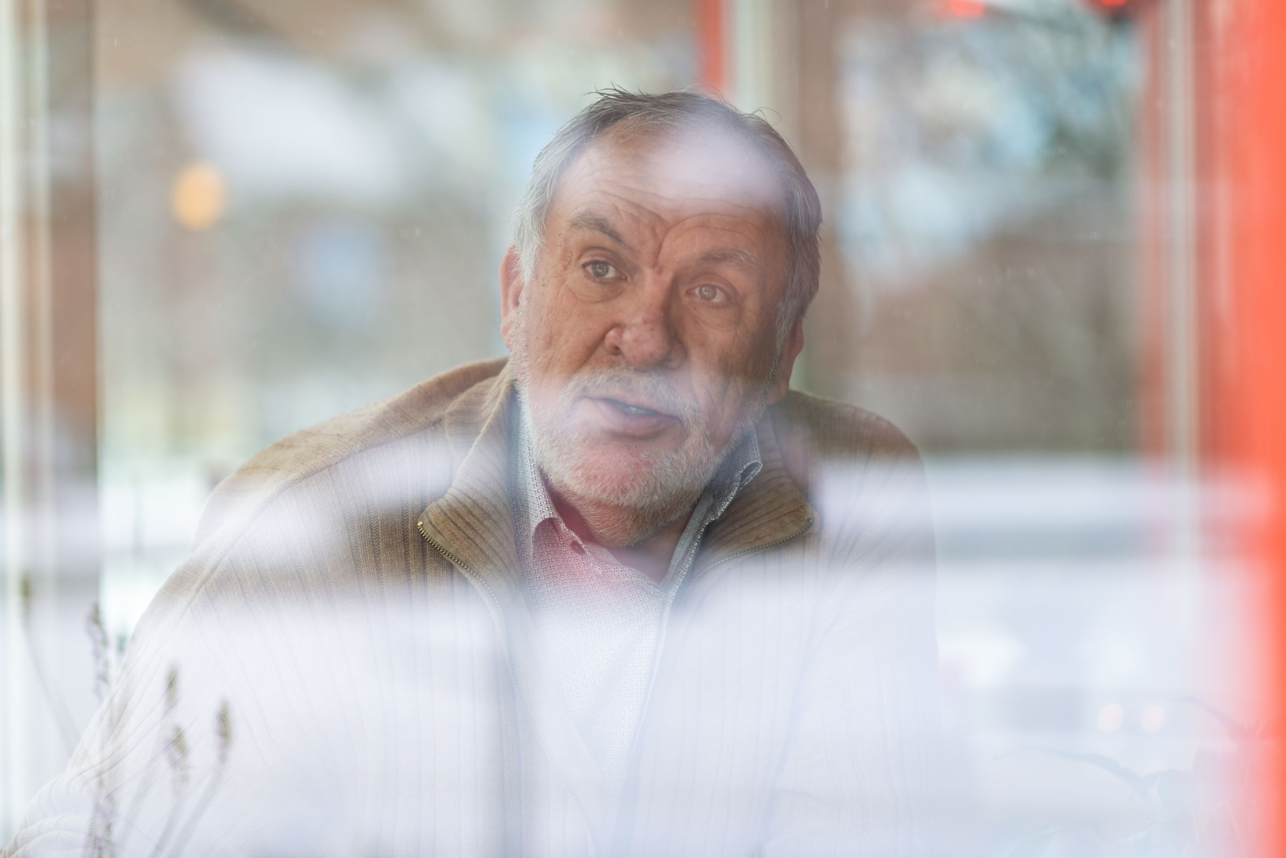 Portrait of Alfredo through a window