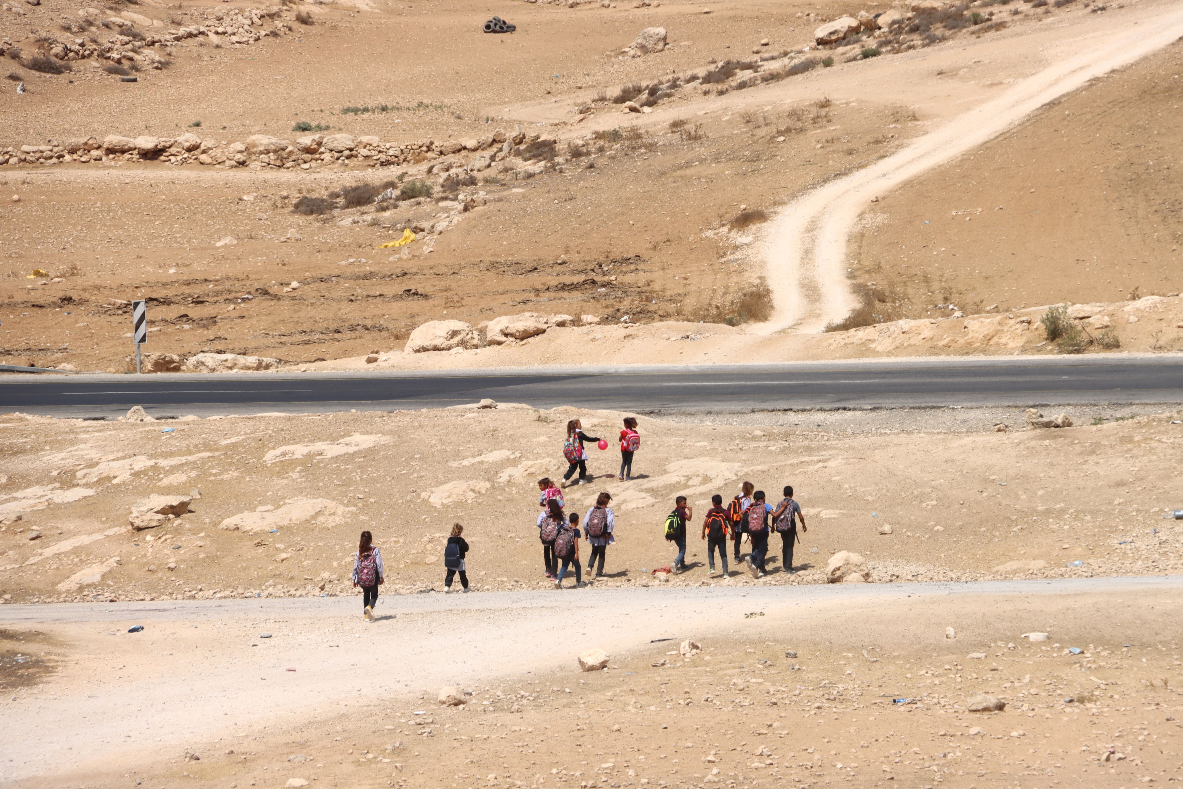Children crossing a road.