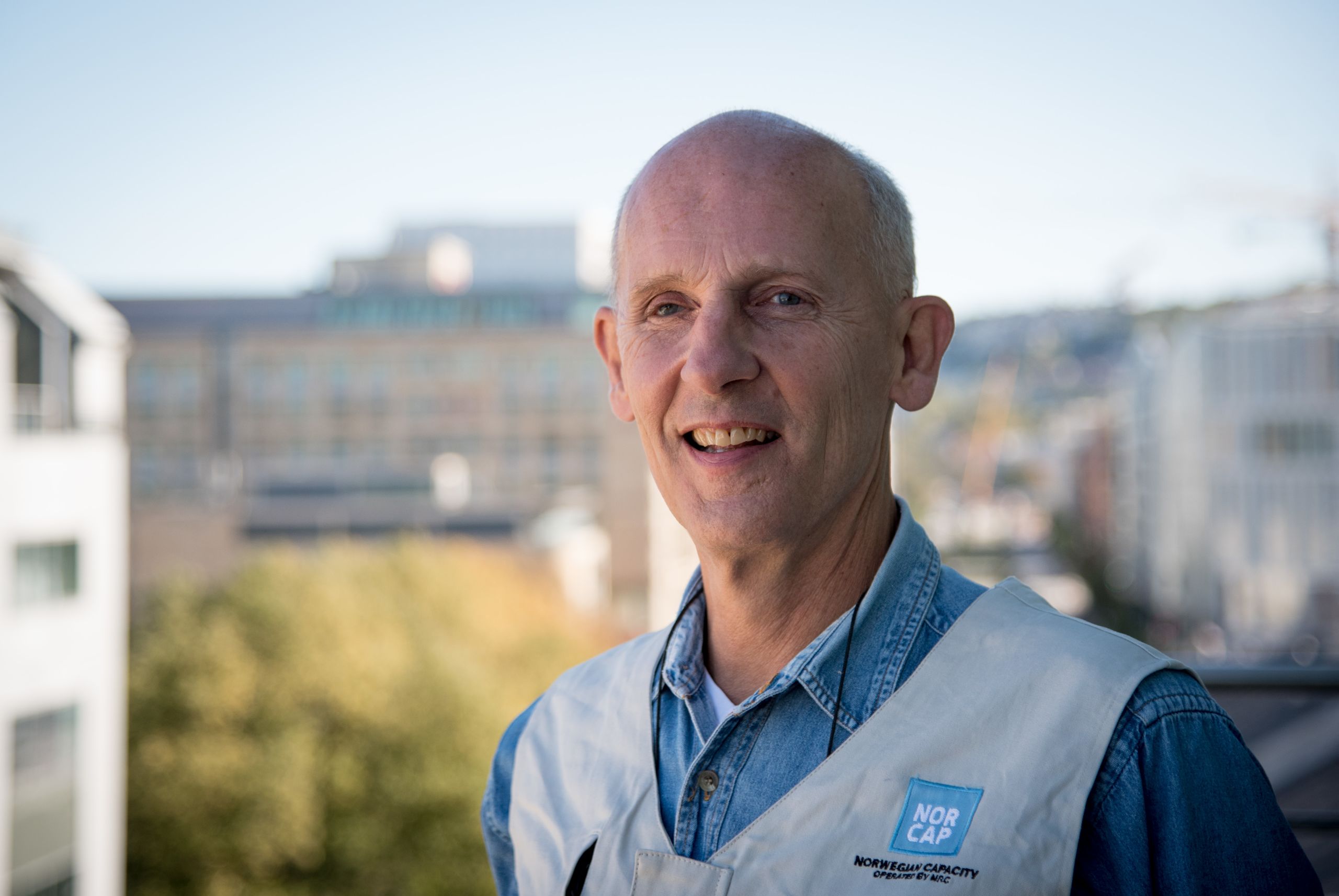 Portrait of Stener Vogt. He is wearing a NORCAP vest.